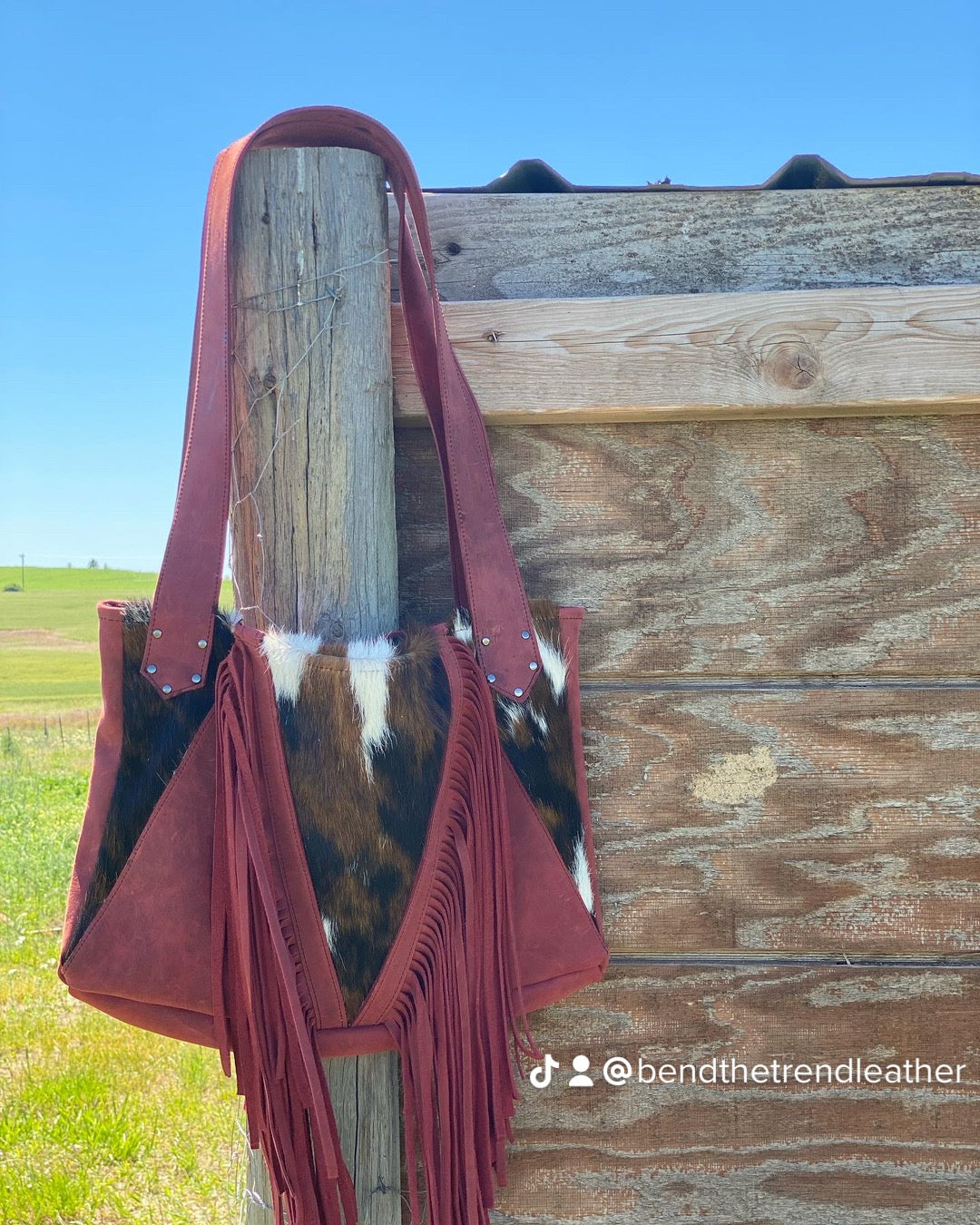 Cowhide shoulder bag