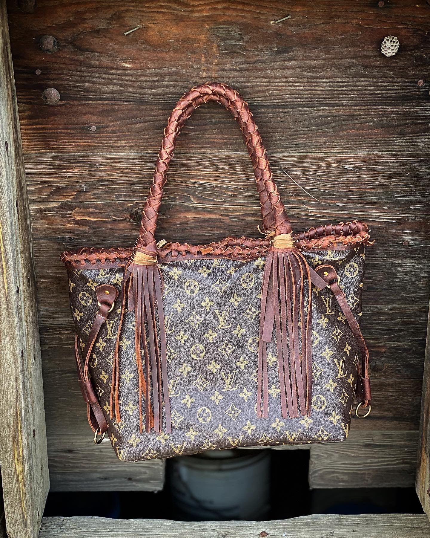 LV BRAIDED LEATHER PURSE